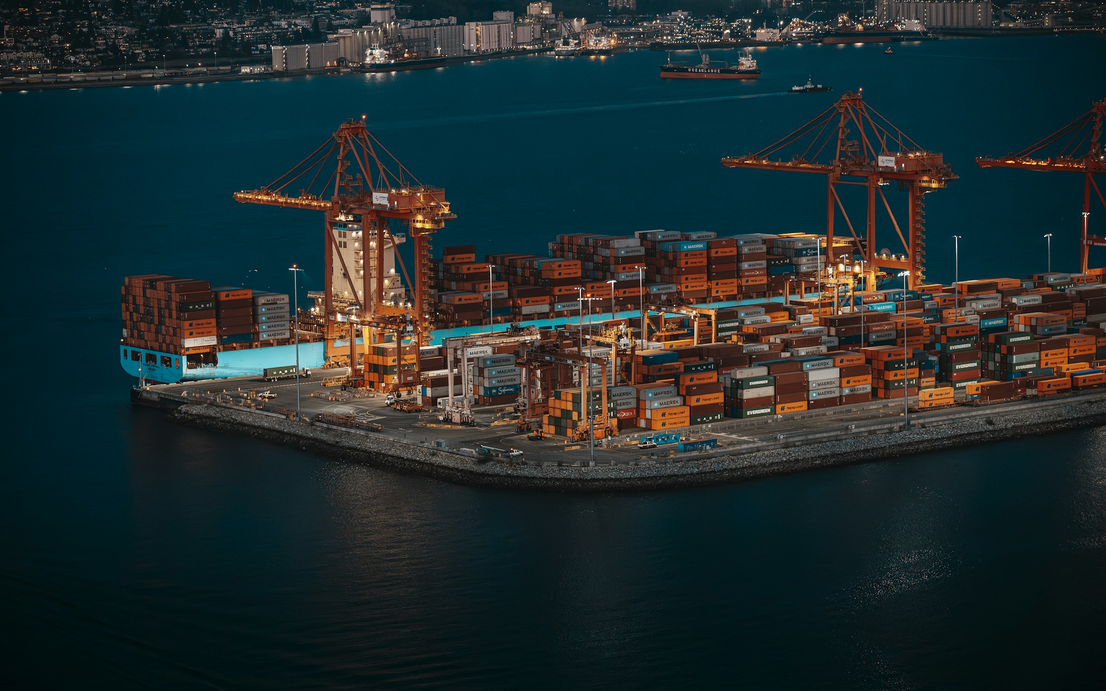 Container terminal cranes illuminated after dark